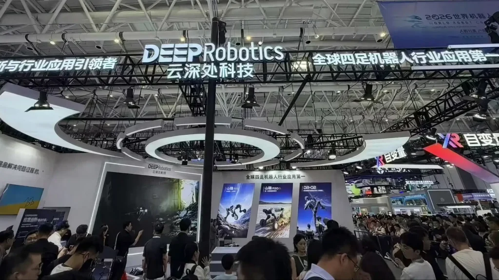 DeepRobotics quadruped robot exhibition booth WRC 2026 service robot design to mass production