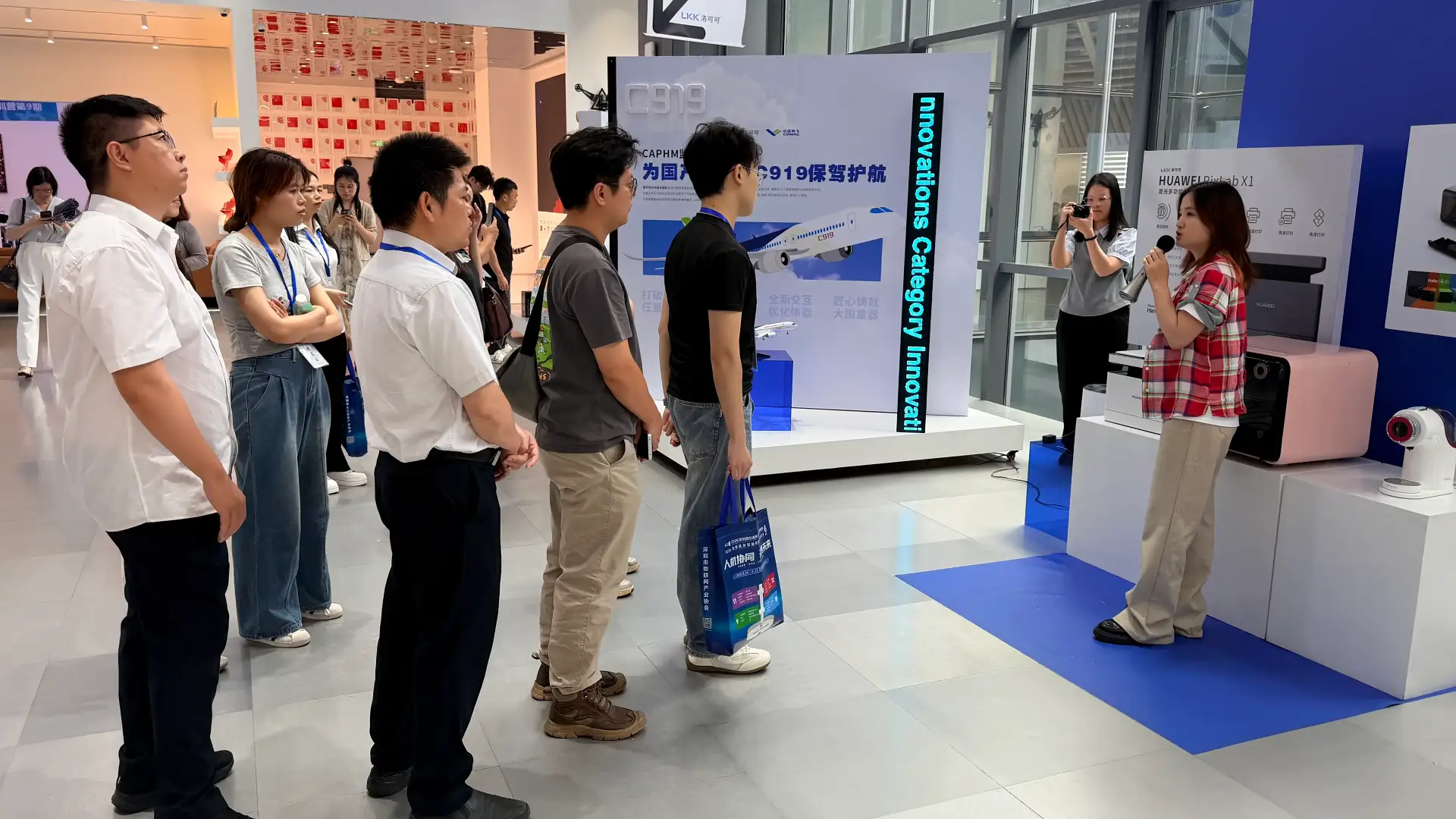 Zhongshan business executives touring LKK Design showroom viewing product innovations